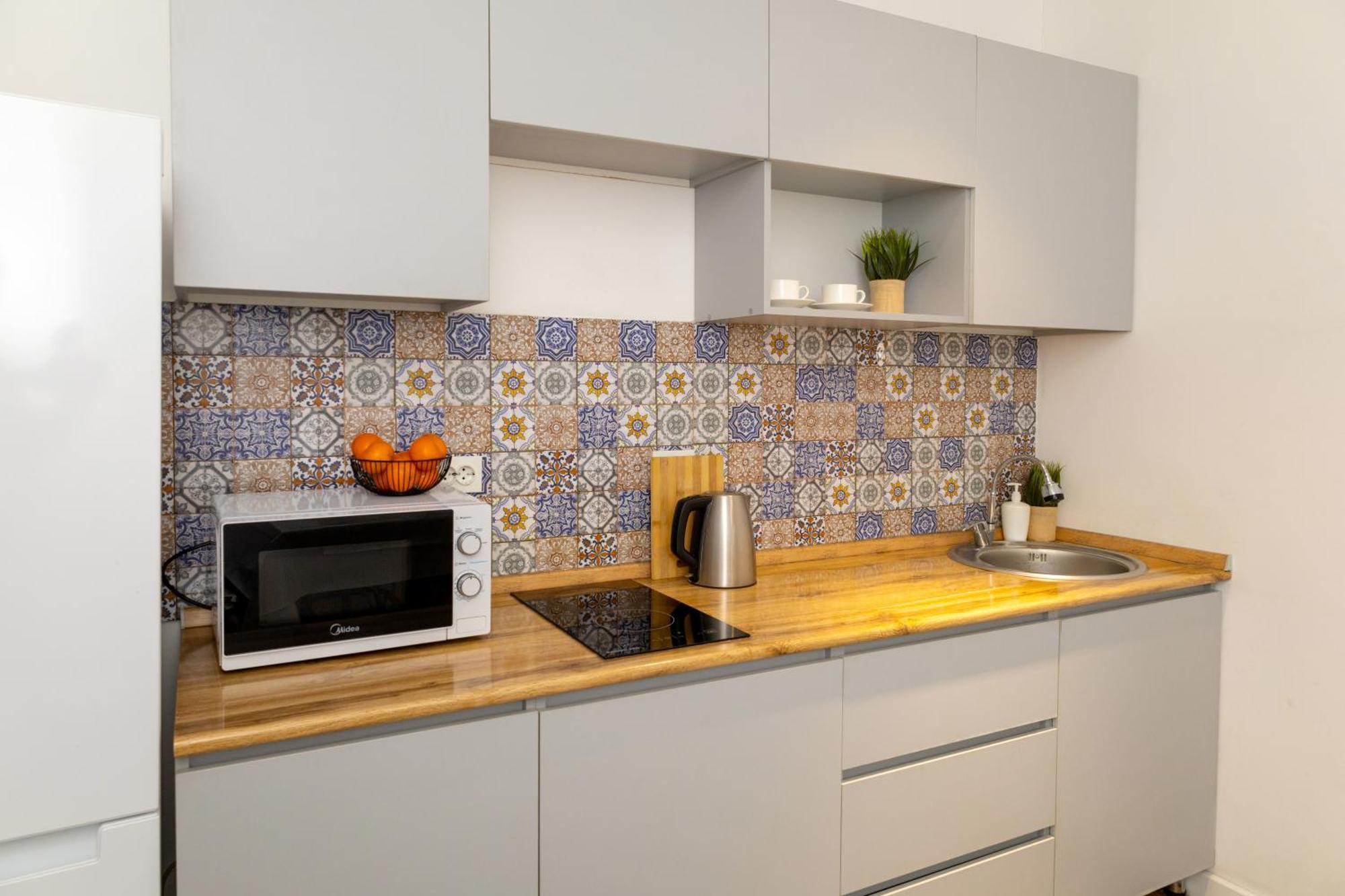дома - в центре Apartment Almaty